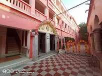 Gated entrance courtyard at Bharat Sevashram Sangha Prayagraj