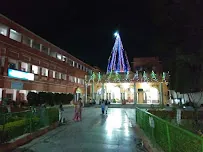 Illuminated courtyard common area at Bharat Sevashram Sangha Prayagraj