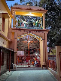 Entrance gateway at Bharat Sevashram Sangha Prayagraj, illuminated at night